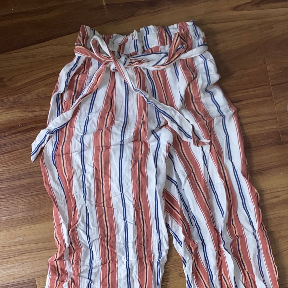 Like new, worn once or twice, size S, with adjustable or removable belt